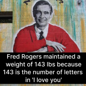 Mural of Fred Rogers in his red sweater with the caption, Fred Rogers maintained a weight of 143lbs because 1 4 3 is the number of letters in I Love You. 